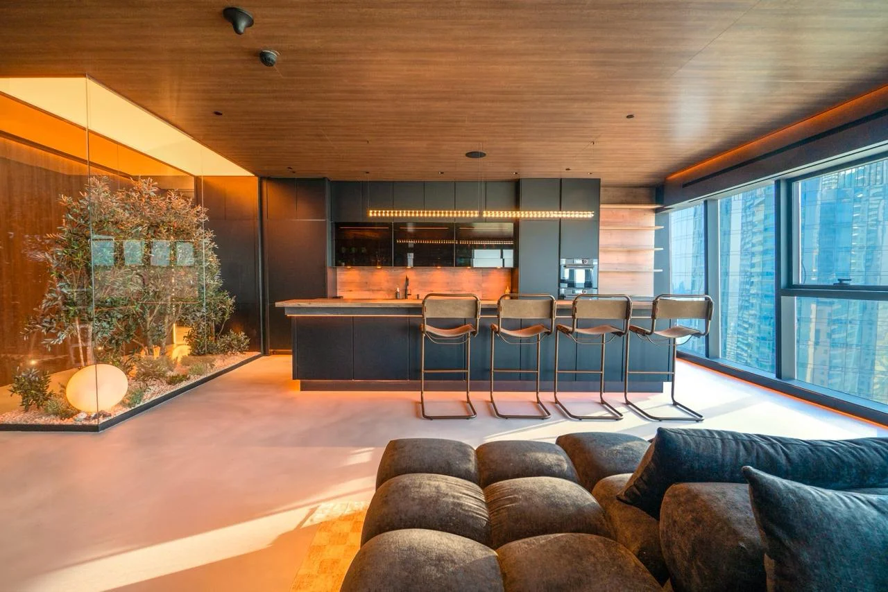 Brushed metal and timber kitchen detail by Blocco25