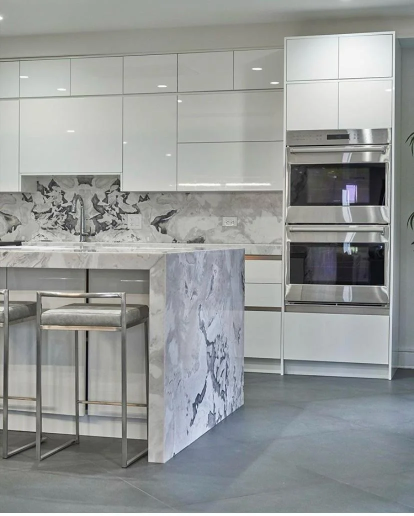 Blocco25 renovated residential interior in Dubai with marble island and bespoke joinery